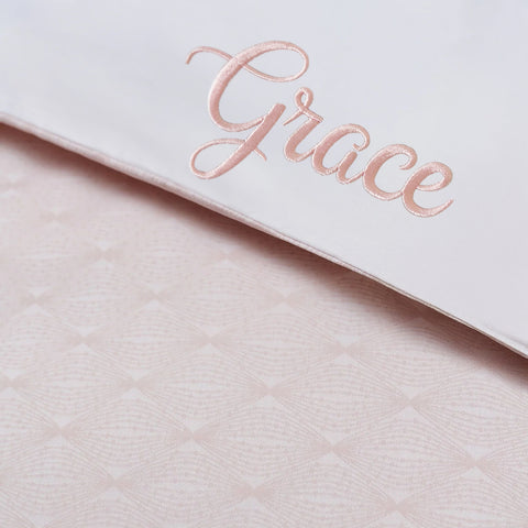 monogram "Oliver" on "Into The Woodlands " on baby duvet in color blue